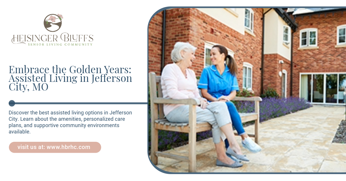 A caregiver happily talking to her elderly woman patient outside an assisted living facility.