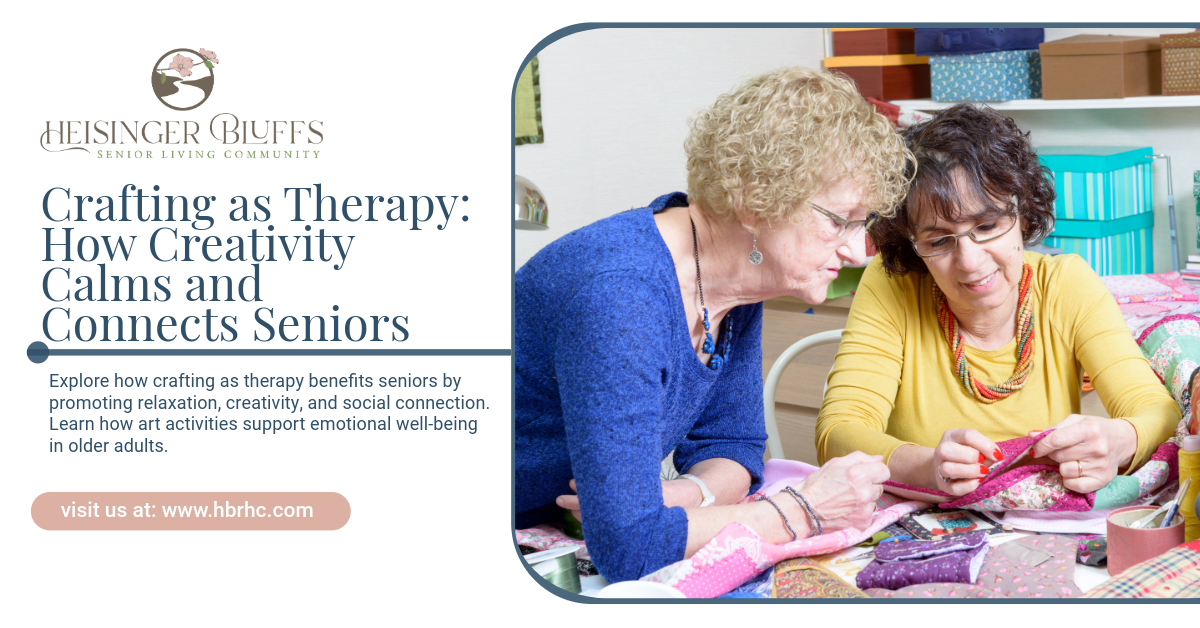 Two elderly women are sitting at a table making crafts.