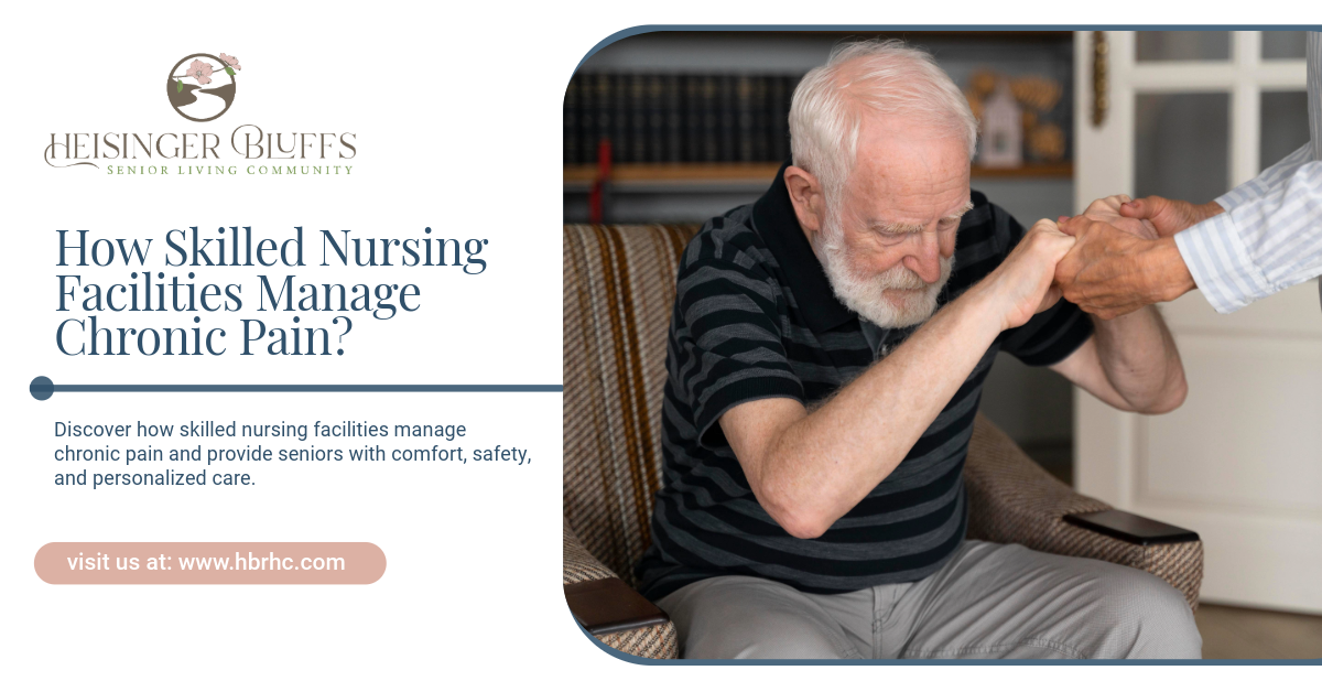 An elderly man is assisted by another person to stand up in a nursing home, managing chronic pain.