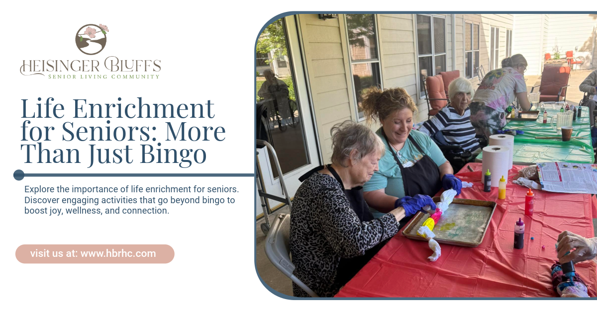 A group of people are sitting at a table making crafts.