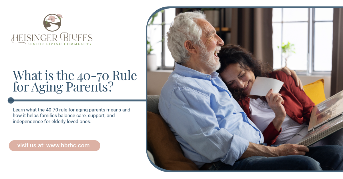 A woman is laughing with her elderly father on a couch