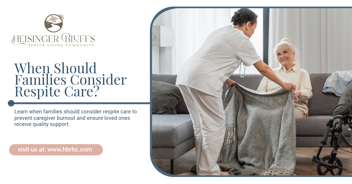 A nurse is helping a senior put on a blanket