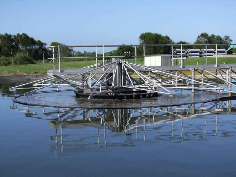 A large metal structure is sitting in the middle of a body of water - Engineering Tooling In Thornton, NSW