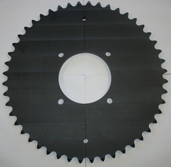 A black sprocket with a hole in the middle - Engineering Tooling In Thornton, NSW