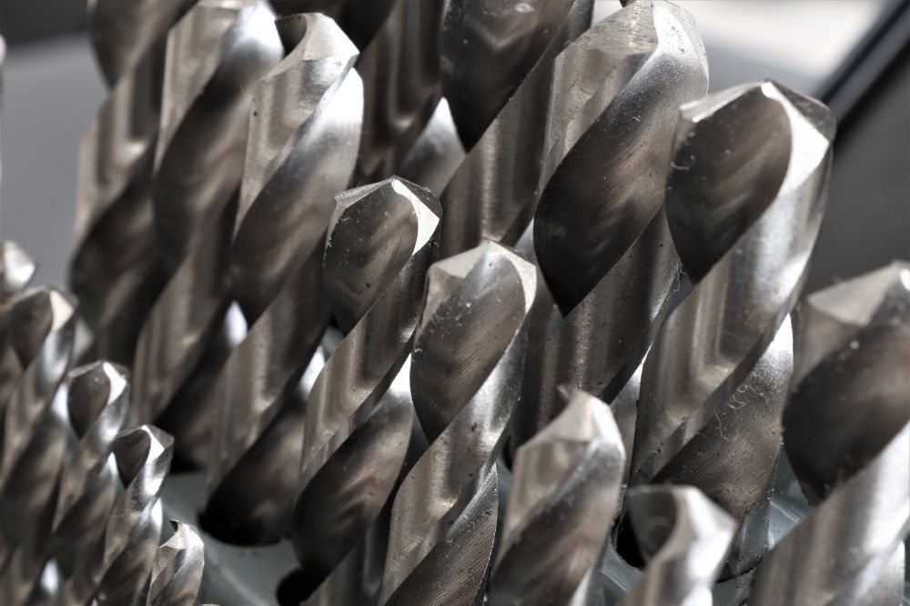 A bunch of drill bits are stacked on top of each other - Engineering Tooling In Thornton, NSW