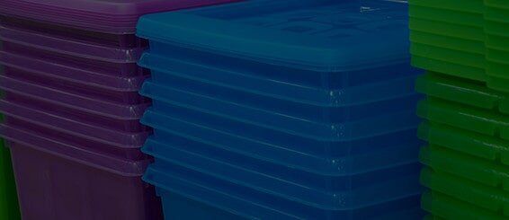 A close up of a stack of plastic containers of different colours - Engineering Tooling In Thornton, NSW
