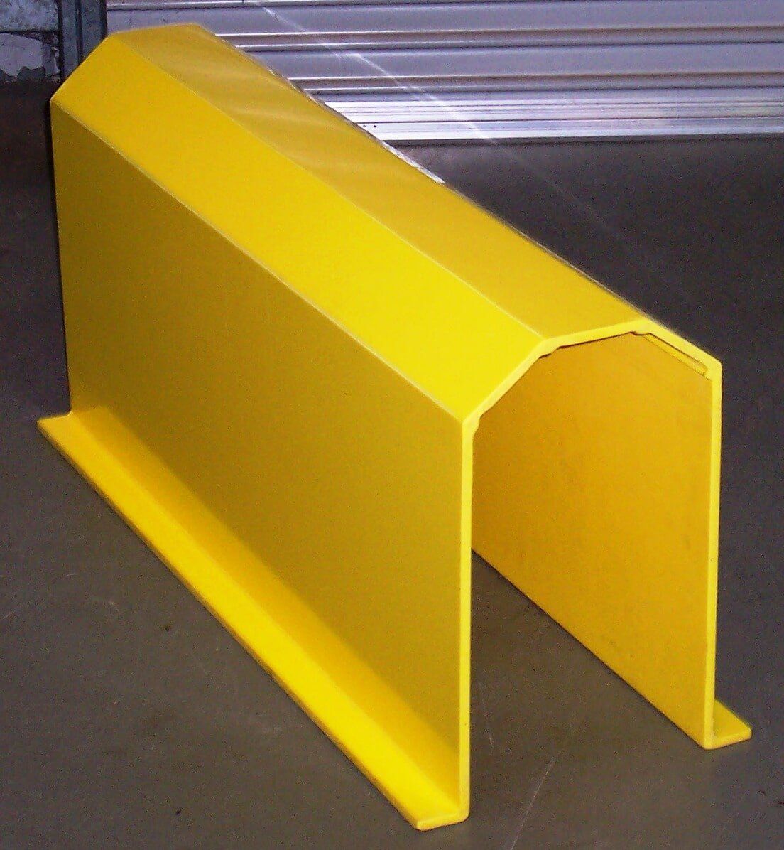 A yellow item that looks like a tunnel is sitting on the ground - Engineering Tooling In Thornton, NSW