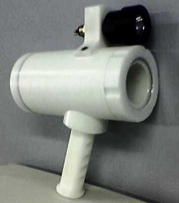 A white object with a black handle is sitting on a table - Engineering Tooling In Thornton, NSW