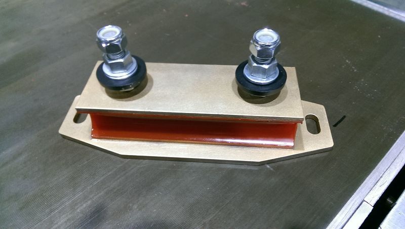 A piece of metal with two nuts on it is sitting on a table - Engineering Tooling In Thornton, NSW