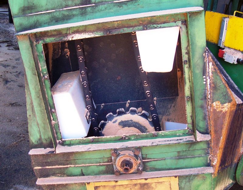 A green and yellow machine with a broken window - Engineering Tooling In Thornton, NSW