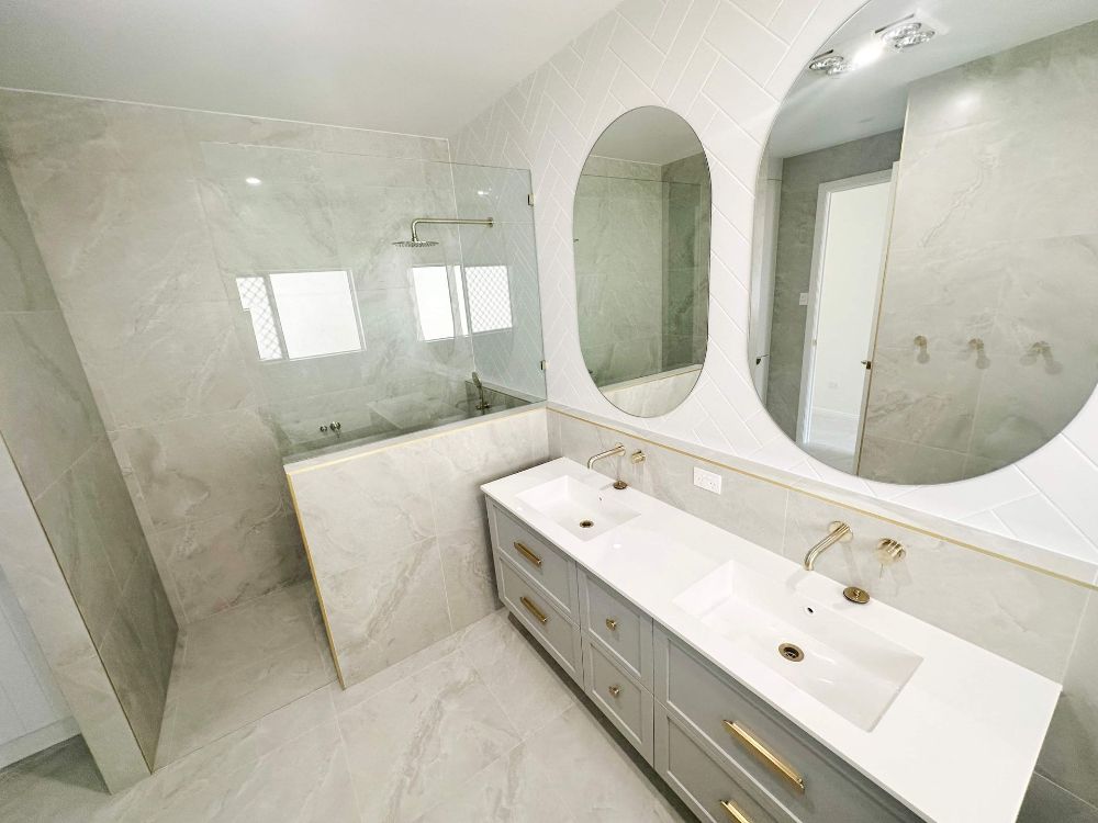 There is a Large Island in the Middle of the Kitchen — Werry Building Services in Boyne Island, QLD