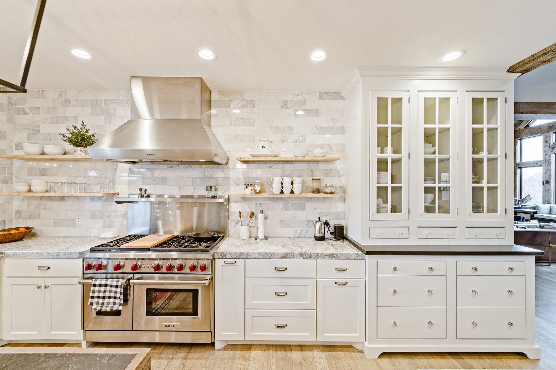 Stove system and white cabinets.