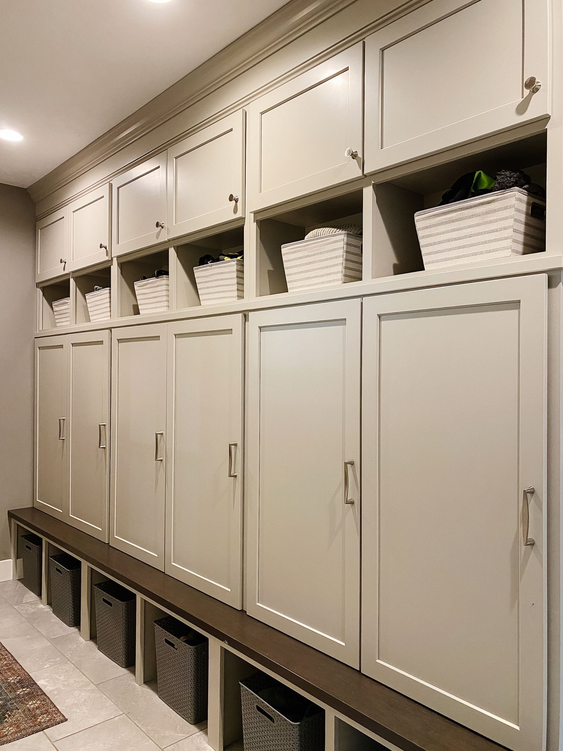 Areas for placing dirty laundry, and to fold and put away clean laundry.