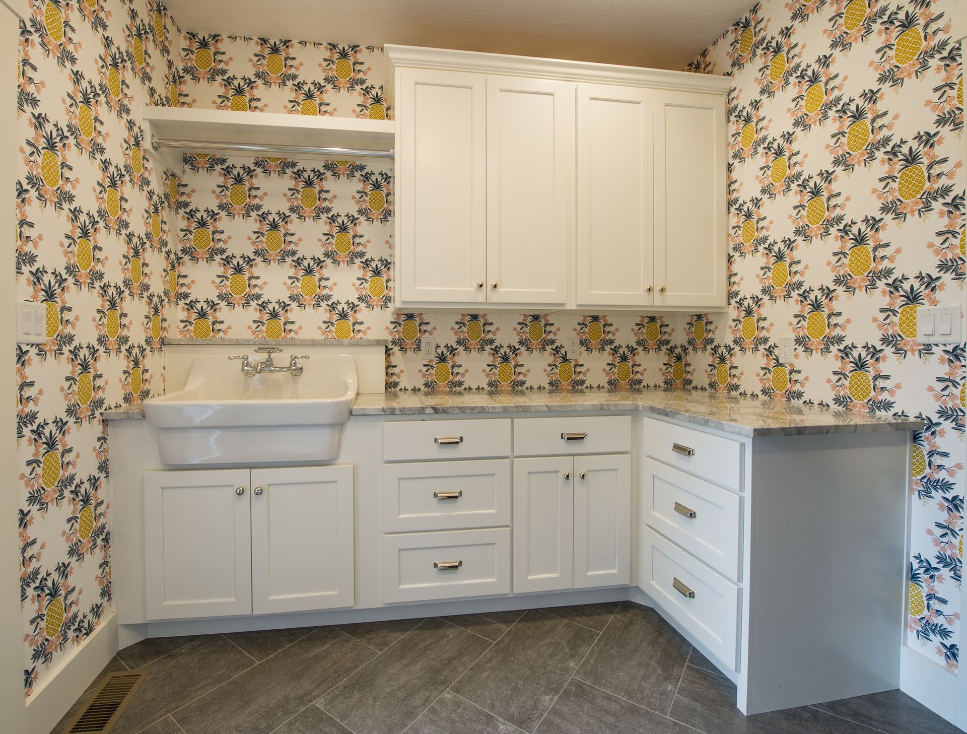 Mudroom sink and numerous drawers and cabinets.