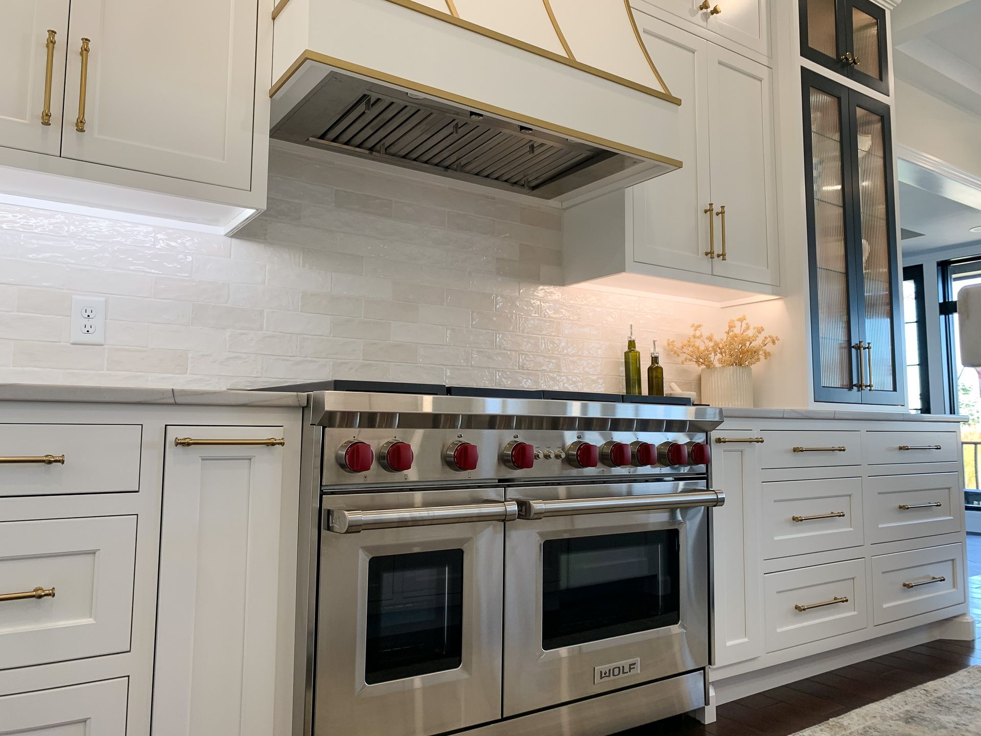 Stovetop set neatly alongside countertops.