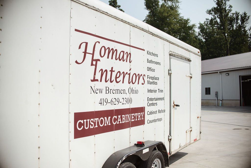 A trailer for Homan Interiors used to transport materials and tools.