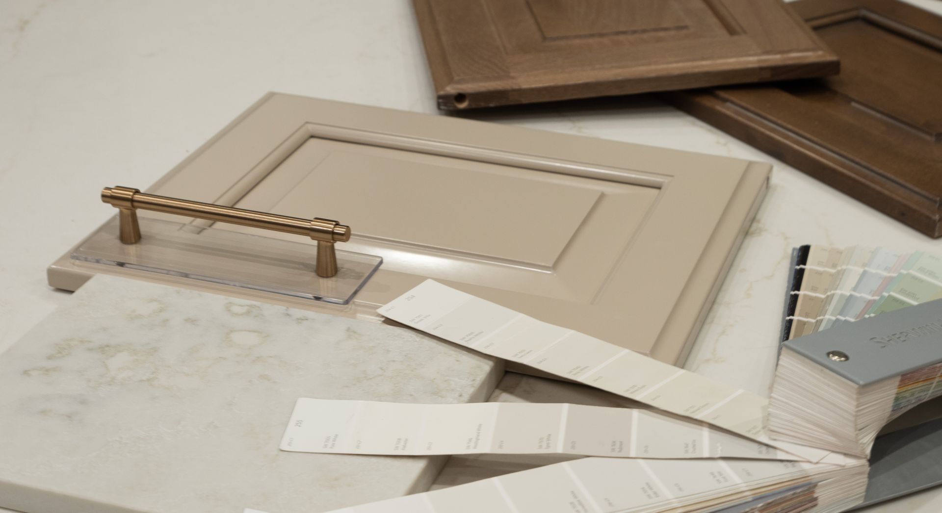 cabinet doors laid out in a kitchen under construction.