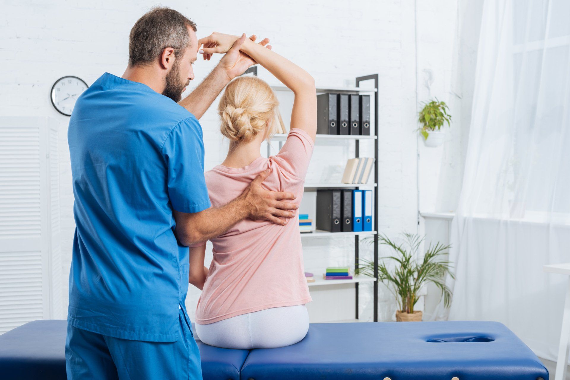 Physiotherapist Stretching Patients Arm — Hastings, NE — Adams County Chiropractic