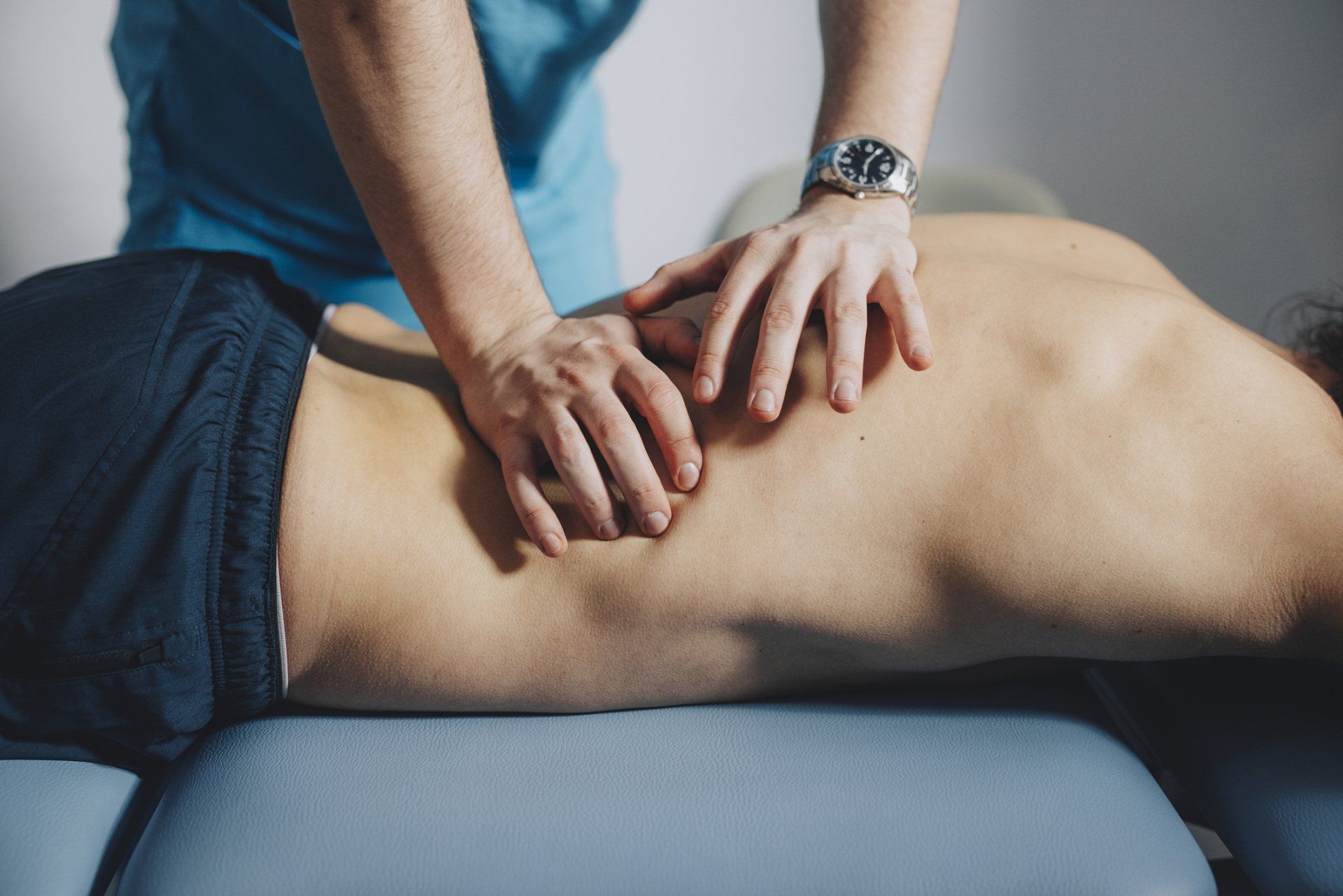 Physical Therapist Massaging Lower Back — Hastings, NE — Adams County Chiropractic