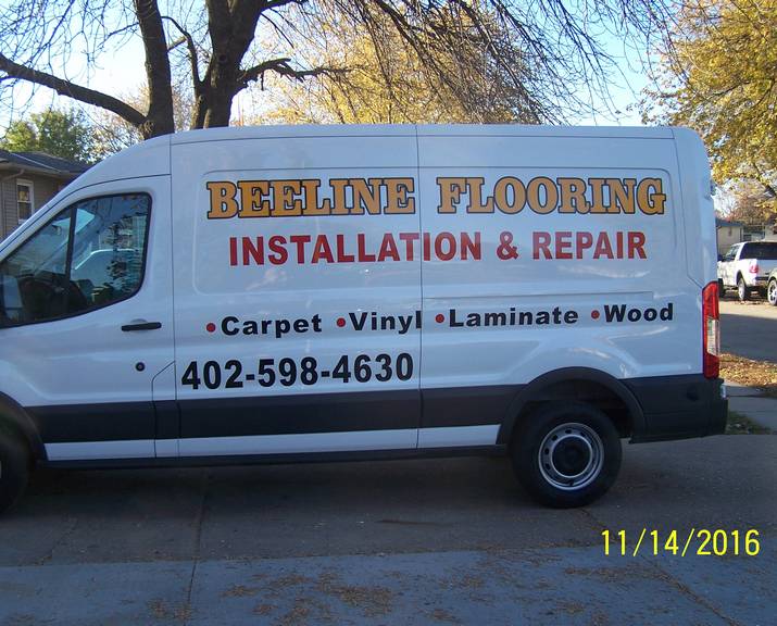 Side of a vehicle - custom wood, aluminum & lighted signs in Council Bluffs, IA