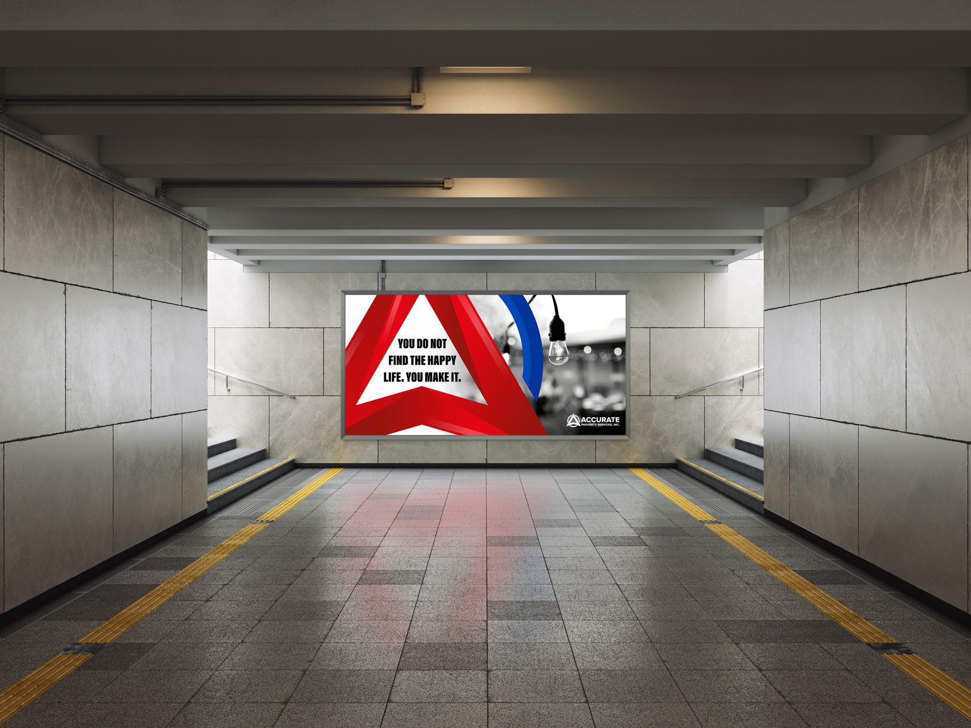 Empty subway tunnel with a lit advertising screen at the far end, showing red, blue, and white graphics.