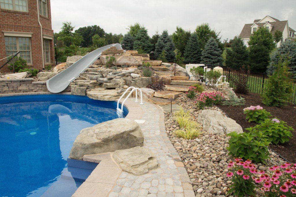 Plants on the side of the pool — landscape plantings in Newville, PA