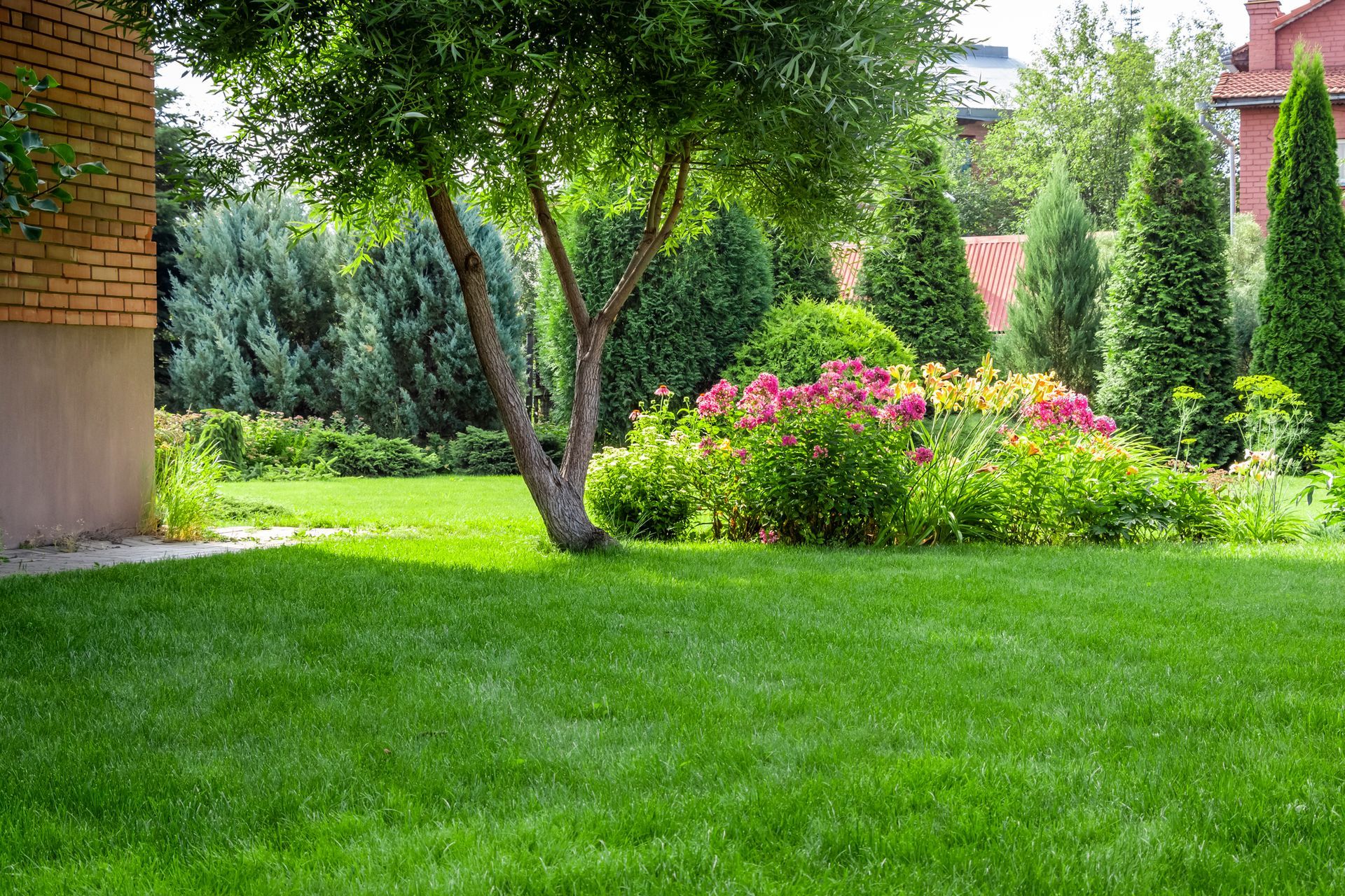 A beautiful flower bed in the backyard of a private house | Landscaping | Harrisburg, PA