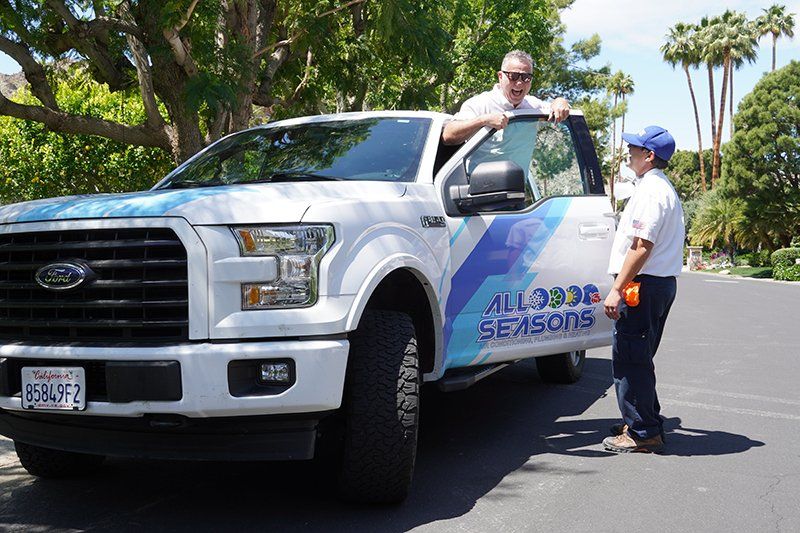 All Seasons Company truck & team members