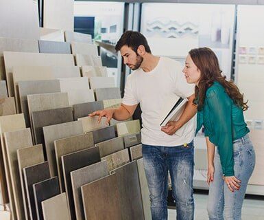 Couple Checking Tiles — Tiles Rockhampton in North Rockhampton, QLD