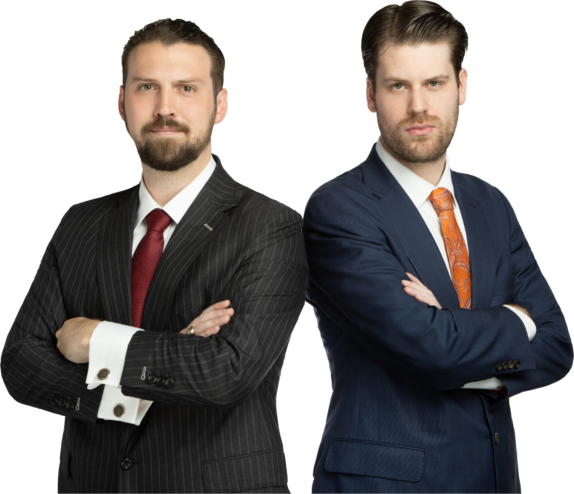 Two men in suits with arms crossed, standing back to back.