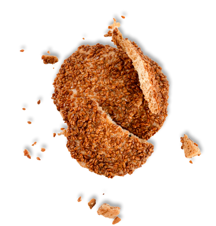 A cookie that has been broken in half on a white background