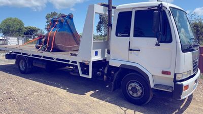 Excavator Bucket Loaded in Tow Truck — Towing and Transport in Sunshine Coast, QLD