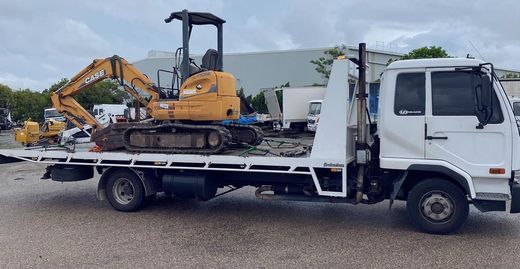 Excavator Loaded in Tow Truck — Towing and Transport in Sunshine Coast, QLD