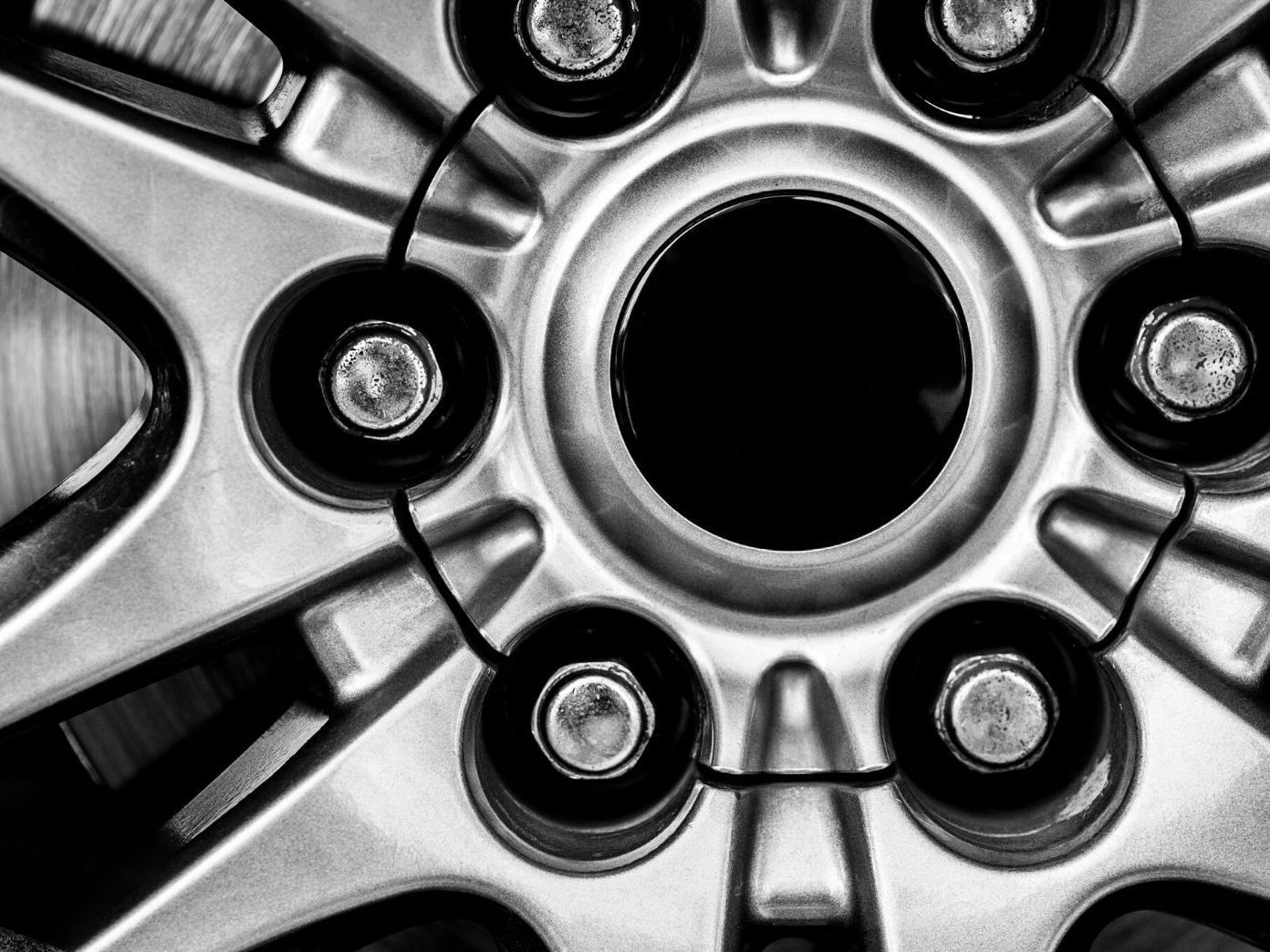a close up of a car wheel with the word porsche on it