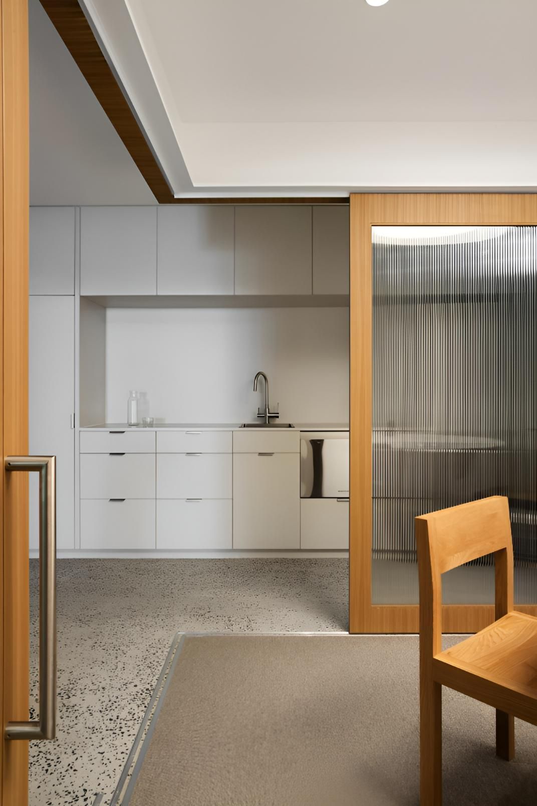 A Room With a Sliding Glass Door Leading to a Kitchen — Precision Kitchens & Cabinets in Ballina, NSW