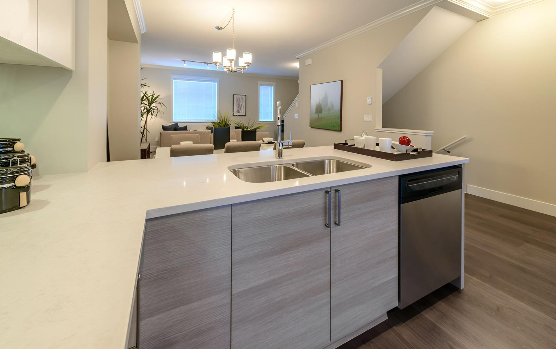 A Kitchen With a Sink and a Dishwasher in It — Precision Kitchens & Cabinets in Murwillumbah, NSW