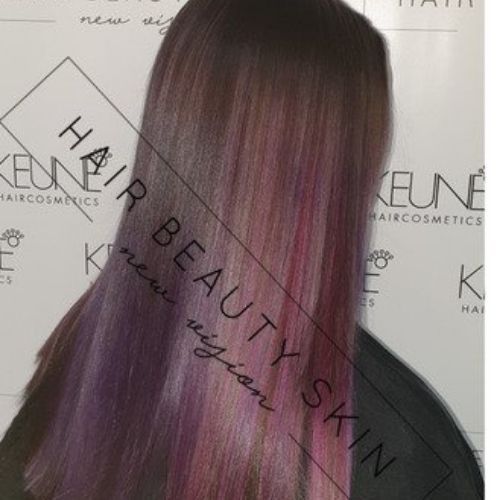 A woman with purple hair