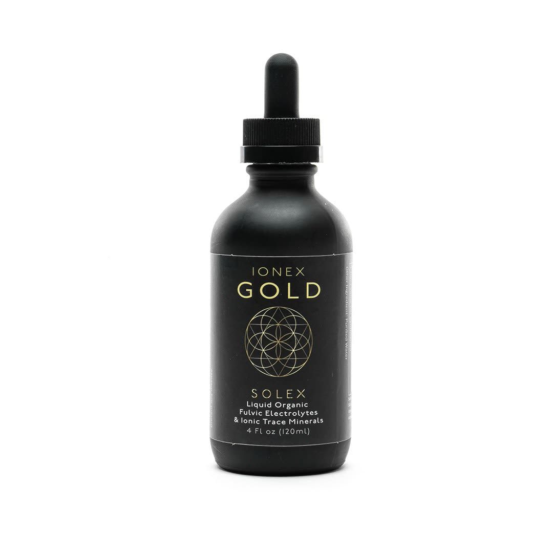 Black bottle of Ionex Gold supplement with dropper.