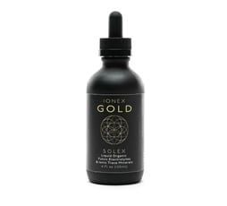 Black bottle of Ionex Gold liquid organic, with a dropper top.