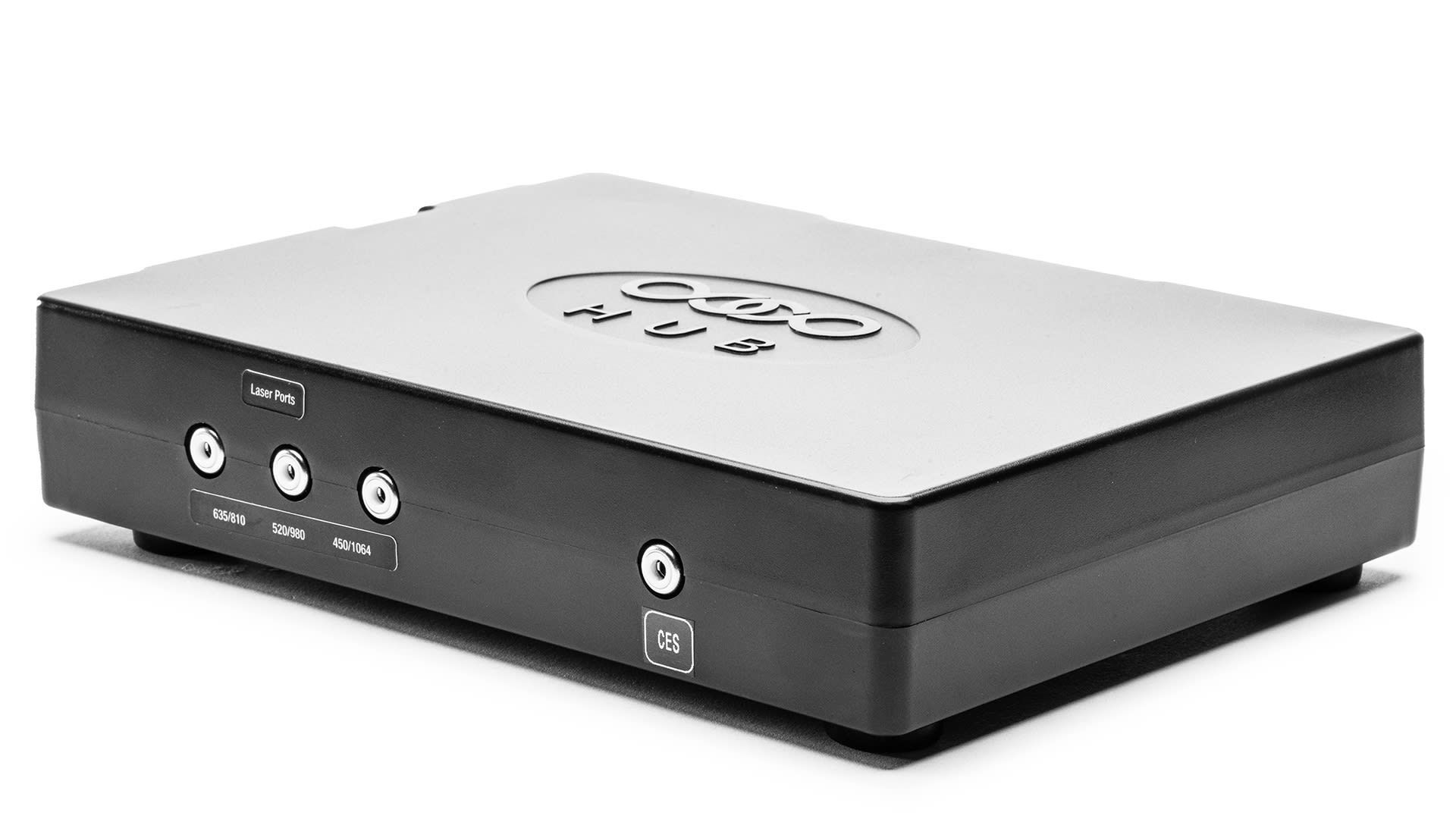 Black and silver audio device with input and output ports, logo on top.