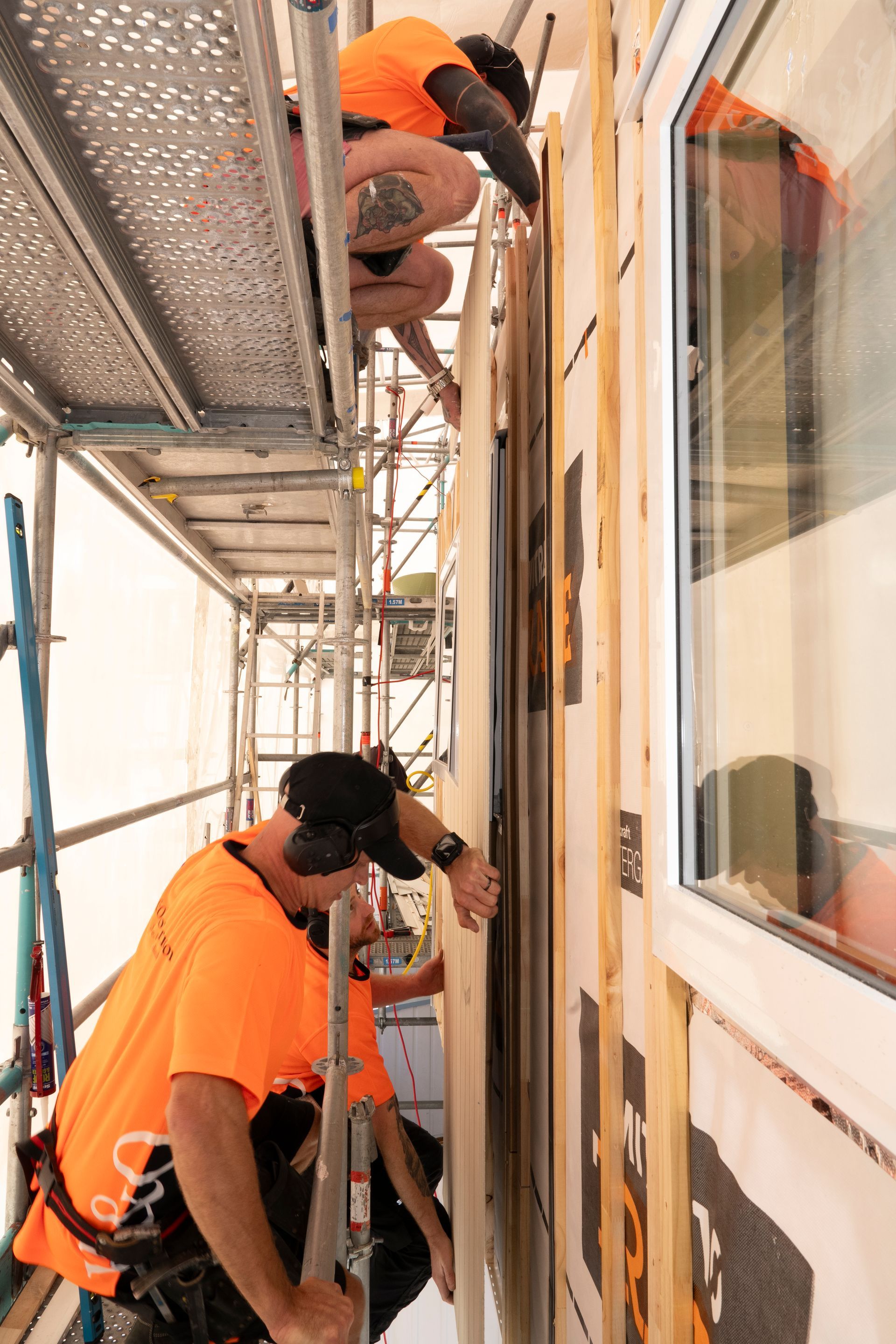 Construction Workers Installing Wall — Wellington, NZ — H & O Construction 