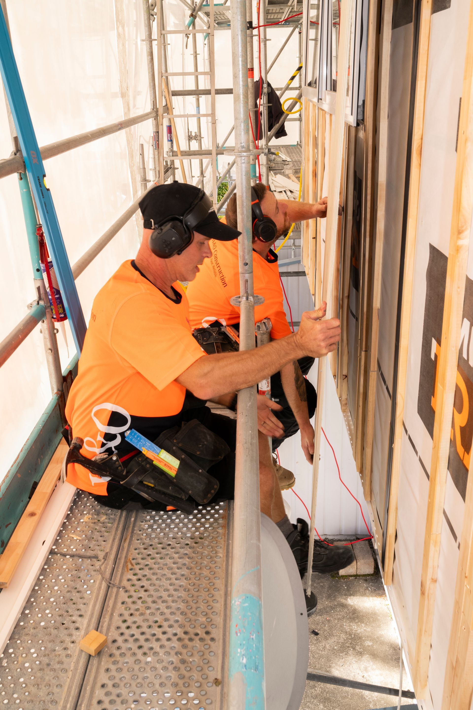 Men Working On A Wall — Wellington, NZ — H & O Construction 