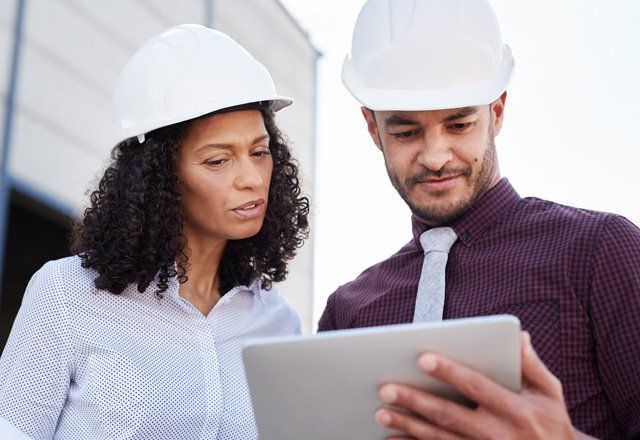 Two Engineers Having A Discussion — Clinton, MS — Cornerstone Engineering LLC