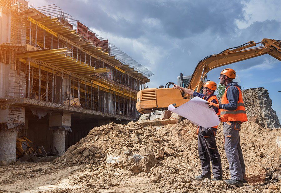 Men Infront Of Building During Construction — Clinton, MS — Cornerstone Engineering LLC