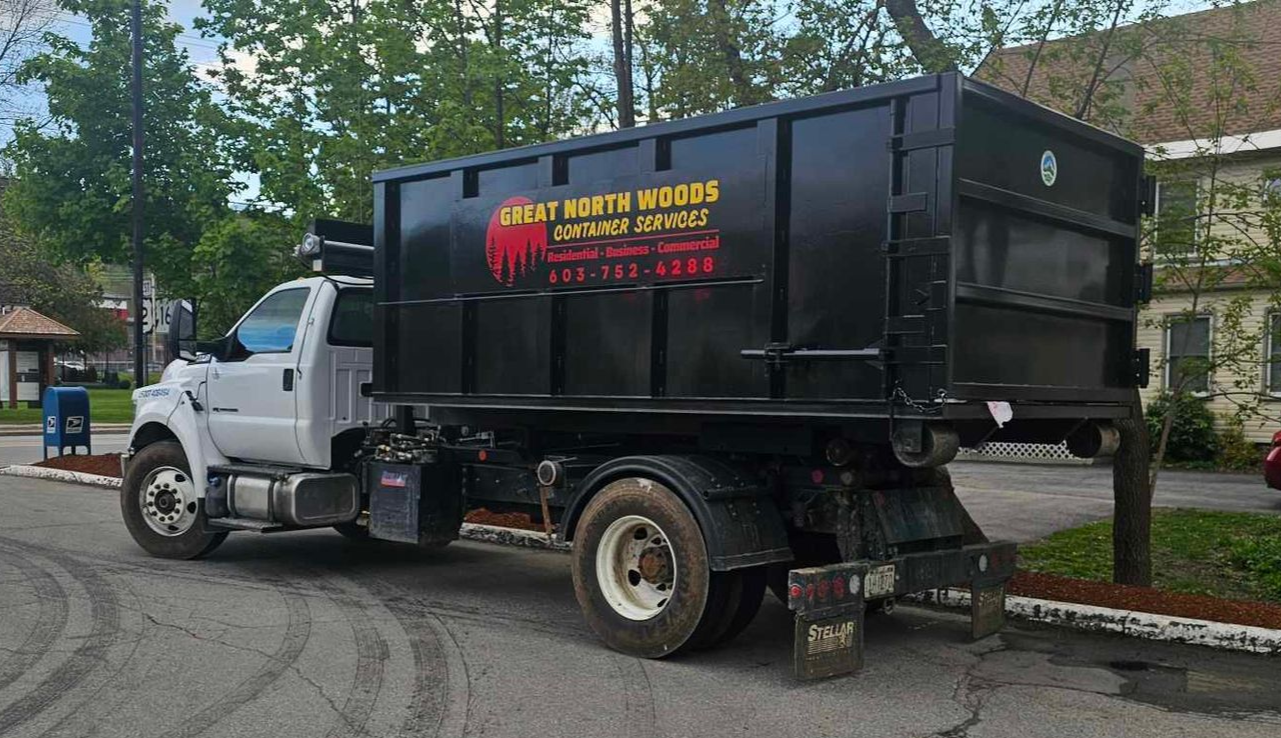 Black dumpster with 