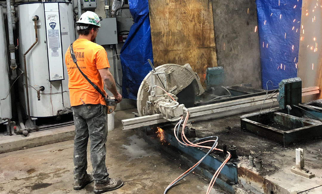 a concrete cutting saw in action