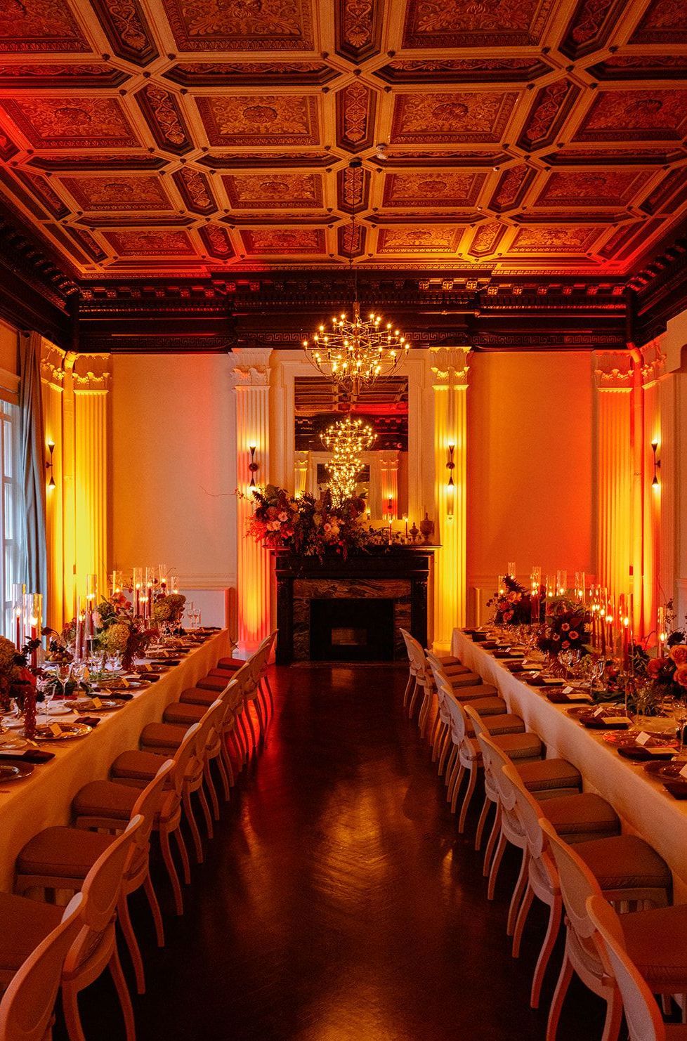 a large room with lots of windows and a projector on the ceiling .