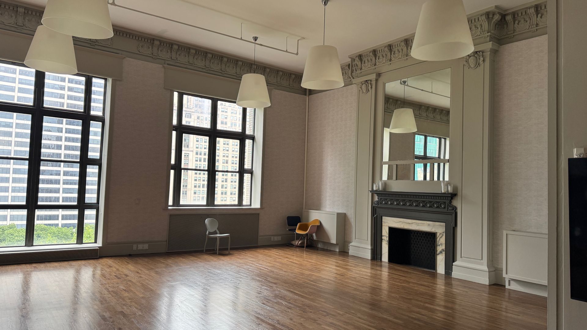 There is a fireplace in the middle of the room.