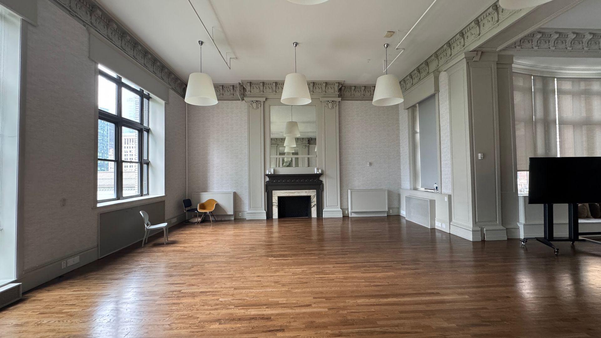 There is a fireplace in the middle of the room.