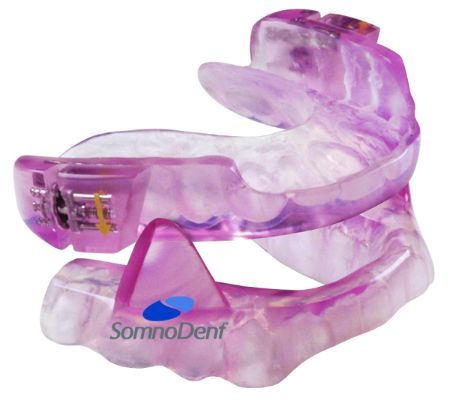 Purple oral appliance designed by Somnodent.